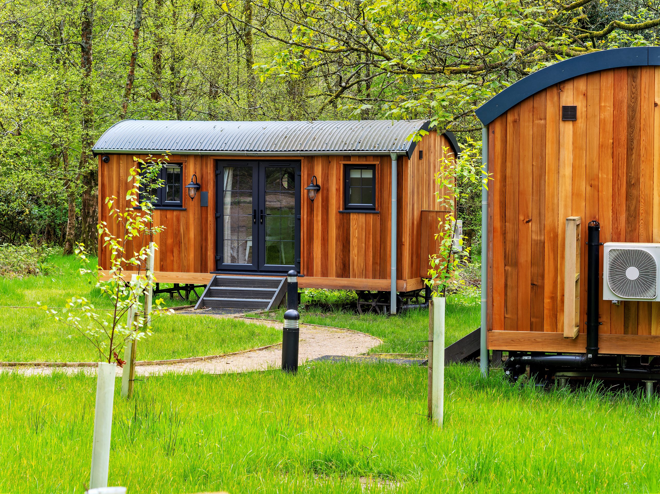 Tiny wooden homes and cabins in a rural setting